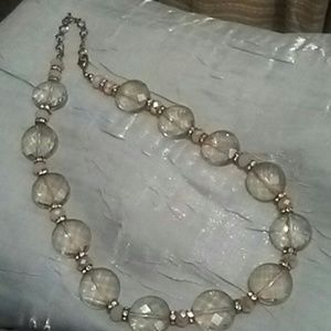FACETED NECKLACE WITH GOLD COLORED ACCENTS